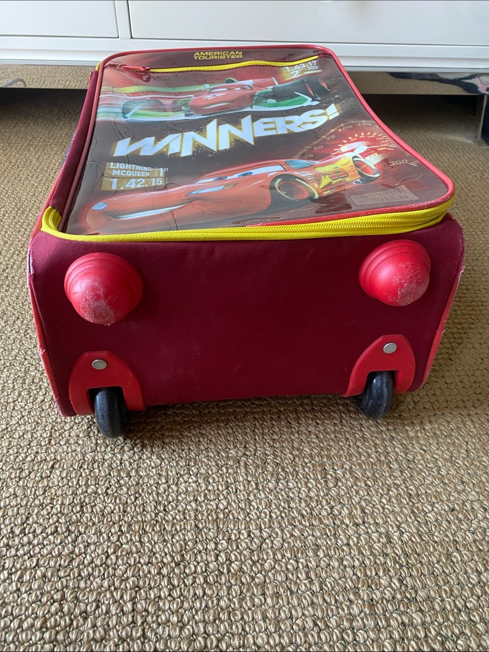American Tourister Red and Yellow Lightning McQueen Rolling Luggage - Picture 2 of 7